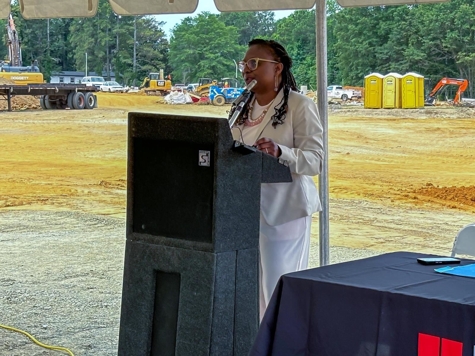 Board Vice-chair Monika Johnson-Hostler gives a speech